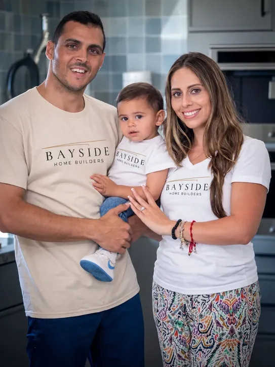 BaysideOwner Ben Shoval, owner of Bayside Home Improvement, with his family in a Phoenix kitchen